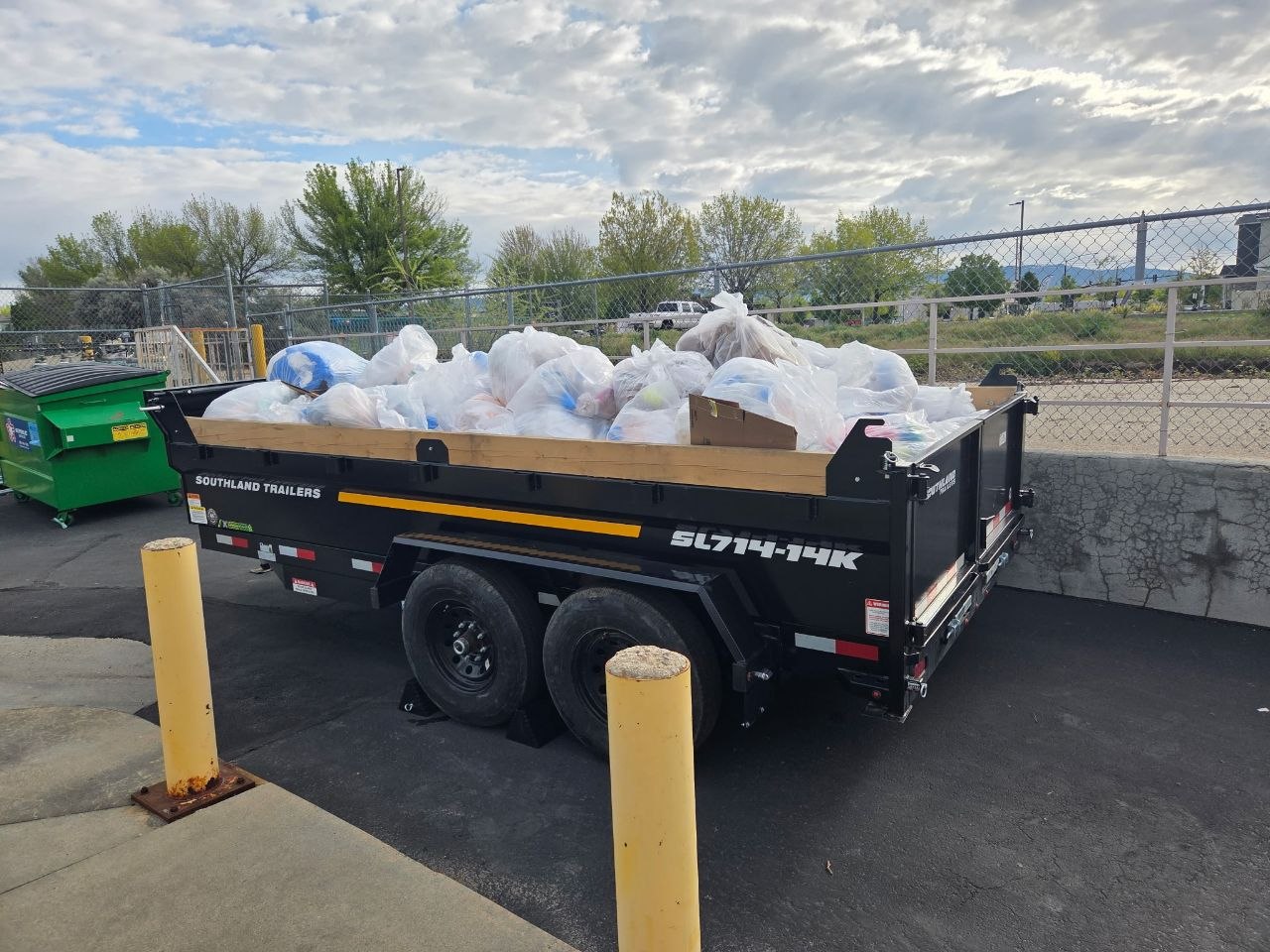 Trailer full of bagged junk ready for haul-off