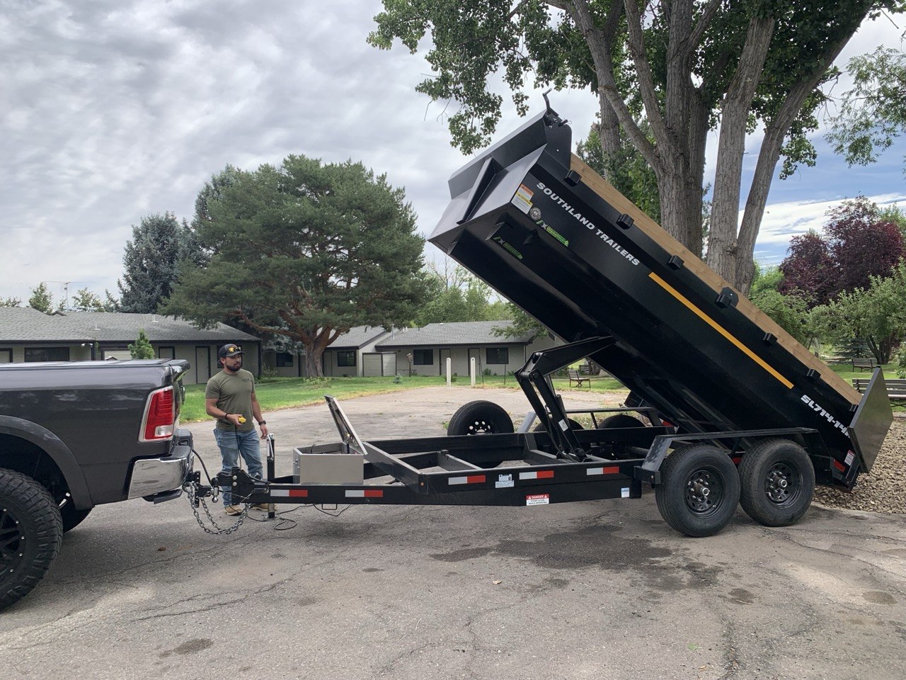 Dynamo Hauling owner operating the 7×14 hydraulic dump trailer in Boise, Idaho